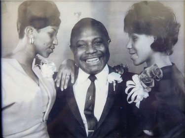 Aretha Franklin (L) with her father C.L. Franklin and sister Caroline in this undated handout photo from the New Bethel Baptist Church.