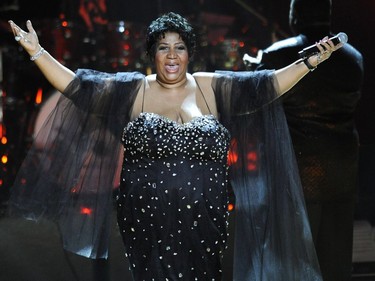 In this file photo taken on July 18, 2009 Aretha Franklin performs during the finale at Radio City Music Hall for the 91st birthday concert for Nelson Mandela. - Aretha Franklin died at the age of 76 on August 16, 2018 at her home in Detroit according to her publicist.