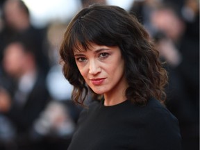 (FILES) In this file photo taken on May 19, 2018 Italian actress Asia Argento arrives for the closing ceremony and the screening of the film "The Man Who Killed Don Quixote" at the 71st edition of the Cannes Film Festival in Cannes, southern France. - Italian actress Asia Argento, who became a leading figure in the #MeToo movement after accusing powerhouse producer Harvey Weinstein of rape, paid hush money to a man who claimed she sexually assaulted him when he was 17, The New York Times reported Sunday.