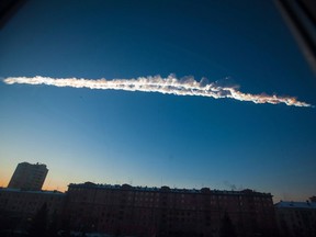 A meteorite contrail is seen over the Ural Mountains' city of Chelyabinsk, about 1,500 kilometres east of Moscow, in 2013.