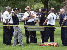 New Haven emergency personnel respond to overdose cases on the New Haven Green in Connecticut on Wednesday, Aug. 15, 2018.