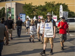 Locked out stagehands with IATSE Local 58, picket an entrance to Exhibition Place in Toronto, Ont. on Wednesday August 15, 2018.