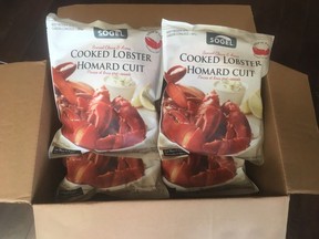 Frozen lobster is seen in this RCMP handout photo. Police in northern New Brunswick are investigating the theft of a large quantity of lobster meat from a shellfish processing plant in the Acadian Peninsula.RCMP say the lobster heist took place early last Friday morning in Saint-Simon, about an hour east of Bathurst.