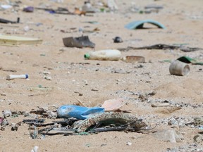 In this May 5, 2016 image provided by the state of Hawaii, ocean debris accumulates in Kahuku, Hawaii on the North Shore of Oahu. Beyond simply piling up along the coast, discarded plastics that end up in the ocean could also be a major source of greenhouse gas emissions, according to a study by a Canadian-led team of researchers from the University of Hawaii.