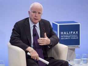 US Senator John McCain speaks at the Halifax International Security Forum in Halifax on Saturday, November 19, 2016. Canadian politicians are expressing their sympathies to the family of Arizona Sen. John McCain, who has died of brain cancer at the age of 81.