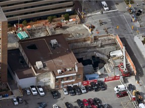 LRT crews construct the walls at Lyon Station west entrance.