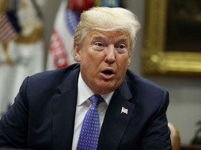 President Donald Trump speaks during a roundtable on the "Foreign Investment Risk Review Modernization Act" in the Roosevelt Room of the White House, Thursday, Aug. 23, 2018, in Washington.