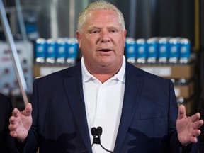 Ontario Premier Doug Ford speaks during the buck-a-beer announcement at Barley Days brewery in Picton, Ont.