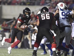 Redblacks tailback William Powell (29) cuts back before running across the goal-line for the game-winning touchdown against the Alouettes on Saturday night.