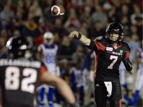 Ottawa Redblacks quarterback Trevor Harris (7) passes to wide receiver Greg Ellingson (82) during first half CFL action against the Montreal Alouettes in Ottawa on Friday, Aug. 31, 2018.