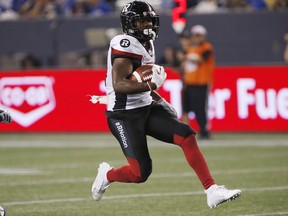 Redblacks tailback William Powell (29) runs into the end-zone for a touchdown in the Aug. 17 game against the Blue Bombers in Winnipeg.
