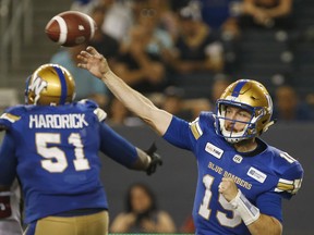 Winnipeg Blue Bombers quarterback Matt Nichols (15) throws against the Ottawa Redblacks during the second half of CFL action in Winnipeg Friday, August 17, 2018.