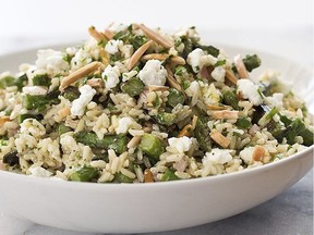 Brown rice salad with asparagus and goat cheese. This recipe appears in the cookbook "Holiday Entertaining."