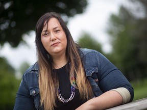 Frances Moore, poses for a photograph in Gibbons Park in London, Ont., on Friday, August 17, 2018. The federal government's intention to enact a statutory holiday aimed at remembering the legacy of Canada's residential school system has drawn mixed reactions from Indigenous Canadians, with responses to the plan ranging from cautious optimism to open disdain. "Reconciliation right now is a great buzz word, but that's kind of where it seems to end," said Frances Moore, an Anishinaabe woman from Timiskaming First Nation in Quebec who now lives in London, Ont. "If this truly is about reconciliation, then great. Do this day, but let's also see action in other ways."