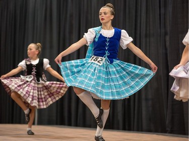 Skyla Campbell (C) competes in highland dancing as the Glengarry Highland Games begin on Friday to celebrate the 71st year.