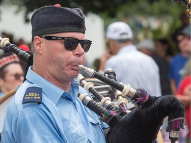 A piper in the South Glengarry Pipes and Drums Band marches past as the Glengarry Highland Games begin on Friday to celebrate the 71st year.