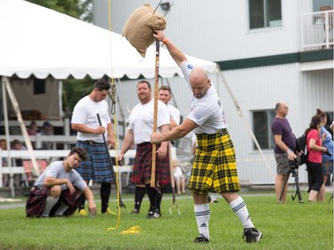 Competitors in the sheaf toss as the Glengarry Highland Games begin on Friday to celebrate the 71st year.