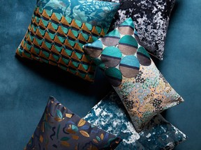 This undated photo provided by West Elm shows some of West Elm's newest pillow collection. Rich, sumptuous hues, and a maximalist melange of patterns have West Elm's newest throw pillow collection hitting all the fall décor trends firmly on target.