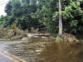 This photo provided by Jessica Henricks shows flooding and damage from Hurricane Lane in Hilo, Hawaii, on Friday. Jessica Henricks via AP