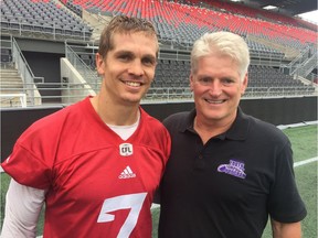 Redblacks QB Trevor Harris, left, has been working with Combat Brain Training guru John Kennedy for the past year. Kennedy was in town Sunday and Monday to work with the full Redblacks roster. Tim Baines/Postmedia