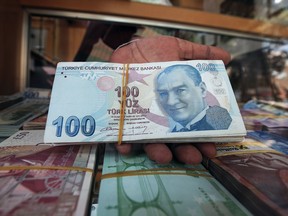 The Turkish lira has lost about a quarter of its value against the dollar since the U.S. sanctioned two ministers in President Recep Tayyip Erdogan's government in a spat over the continued detention of an American pastor in Turkey.