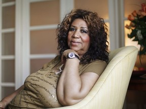 FILE - In this July 26, 2010 file photo, soul singer Aretha Franklin poses for a portrait in Philadelphia. Stevie Wonder visited an ailing Aretha Franklin at her home in Detroit on Tuesday, Aug. 14, 2018. Franklin's publicist Gwendolyn Quinn said Tuesday that the Rev. Jesse Jackson and Franklin's ex-husband, actor Glynn Turman, also visited the Queen of Soul, who is seriously ill.
