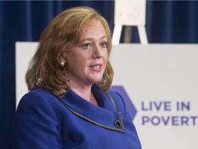 Lisa Macleod, Ontario's Children, Community and Social Services Minister makes an announcement on welfare rates at the Ontario Legislature in Toronto on Tuesday July 31, 2018. Macleod stated that they will increase 1.5% instead of the 3% promises in the Liberals' pre-election budget. The Tories are also winding down the basic-income pilot project.
