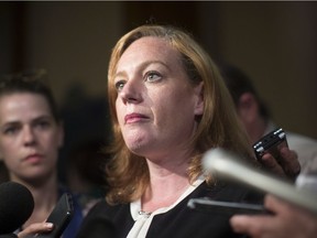 Nepean MPP Lisa MacLeod, Ontario's Children, Community and Social Services Minister, talks with the media after Question Period at the Ontario Legislature in Toronto on Aug. 2.