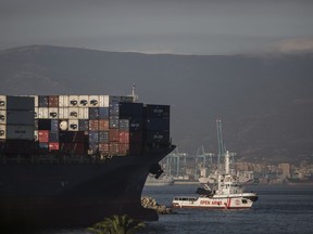 The Open Arms Search and Rescue vessel arrives in Algeciras, Spain, Thursday, Aug. 9, 2018. A rescue boat operated by Spanish aid group Proactiva Open Arms carrying 87 African migrants and refugees saved in the Mediterranean Sea has docked at the southern Spanish port of Algeciras after other, geographically closer, European Union countries refused to let it dock amid continuing strain between governments about how to respond to the wave of migrants crossing from Africa.