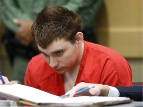 Nikolas Cruz sits in a Broward County courtroom for a hearing on Friday. Cruz faces the death penalty if convicted of killing 17 people in the Valentine's Day attack at Marjory Stoneman Douglas High School.
