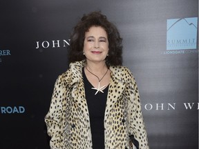 In this Oct. 13, 2014 file photo, actress Sean Young attends a special screening of "John Wick" at the Regal Union Square in New York.   Police say Young is wanted for questioning after she was caught on surveillance video stealing laptops and video production software from a store in New York City. Police say employees at a store in Queens reported a burglary Thursday, Aug. 9, 2018. They say surveillance video showed Young and a male companion breaking in and stealing laptops and software worth about $12,000. A representative for Young did not immediately return a call seeking comment.