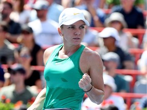 Simona Halep of Romania celebrates a point against Sloane Stephens of the United States during the final of the Rogers Cup tennis tournament Sunday August 12, 2018 in Montreal.