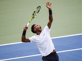 Felix Auger-Aliassime, of Canada, serves to Lucas Pouille, not shown, of France, during the first round of the Men's Rogers Cup tennis tournament in Toronto, Tuesday, August 7, 2018.