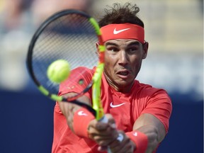 Rafael Nadal of Spain returns to Stefanos Tsitsipas of Greece during championships men's finals Rogers Cup tennis action in Toronto on Sunday, August 12, 2018.