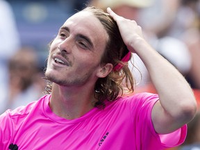 Stefanos Tsitsipas celebrates after defeating Novak Djokovic during the Rogers Cup in Toronto on Thursday August 9, 2018.