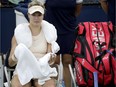 Eugenie Bouchard sits between games in her first-round match against Harmony Tan in New York on Tuesday.