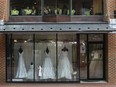 State Police take a break in an office above a closed bridal shop in the downtown area of Charlottesville, Va., Saturday, Aug. 11, 2018.