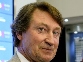 Hockey great Wayne Gretzky talks with the media at the Hlinka Gretzky Cup hockey tournament in Edmonton on August 8, 2018. (PHOTO BY LARRY WONG/POSTMEDIA)