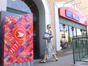 A customer arrives at a Canada Post post office.