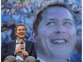 Conservative Leader Andrew Scheer is seen on stage while speaking to delegates at the Conservative national convention in Halifax on Saturday, August 25, 2018.