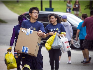 Students were busy moving into the residence buildings at Carleton University on Saturday, Sept. 1, 2018.