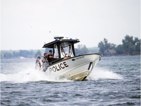 An OPP vessel is seen here in the initial stages of the search for the missing boy on the Labour Day holiday weekend.  Ashley Fraser/Postmedia