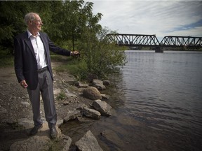 Clive Doucet has an ambitious transit plan for  Ottawa, that includes the Prince of Wales Bridge (in background).