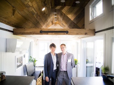 Seungyeon Hong, Master of Applied Science, first-year project manager with the Tiny House Team, and assistant professor Scott Bucking of the Civil Engineering and Architecture program and the project supervisor of the Tiny House Team in the tiny home Saturday.