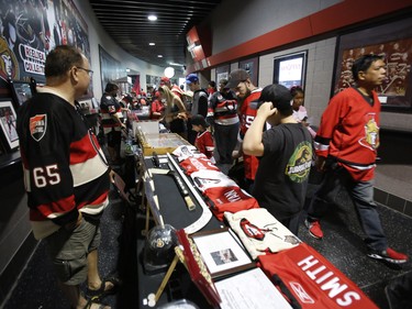 Fans shop for memorabilia at the Ottawa Senators Fan Fest at Canadian Tire Centre in Ottawa on Sunday, September 16, 2018.