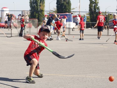 Xander, 4, plays street hockey at the Ottawa Senators Fan Fest at Canadian Tire Centre in Ottawa on Sunday, September 16, 2018.
