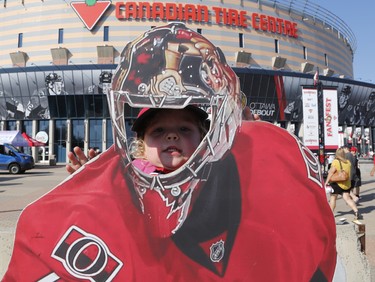 Angelle, 3, poses for a photo at the Ottawa Senators Fan Fest at Canadian Tire Centre in Ottawa on Sunday, September 16, 2018.