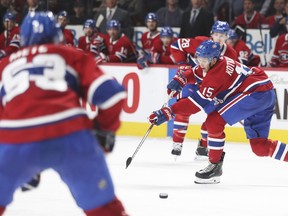 Jesperi Kotkaniemi backhands a pass to Victor Mete, earning an assist on Brendan Gallagher's subsequent goal against the Toronto Maple Leafs during second period of National Hockey League game in Montreal on Wednesday, Sept. 26, 2018.