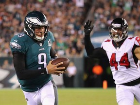 Nick Foles #9 of the Philadelphia Eagles catches a pass thrown by Nelson Agholor #13 (not pictured) during the third quarter against the Atlanta Falcons at Lincoln Financial Field on September 6, 2018 in Philadelphia, Pennsylvania.