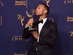 John Legend poses in the press room during the 2018 Creative Arts Emmys at Microsoft Theater on September 9, 2018 in Los Angeles, California.